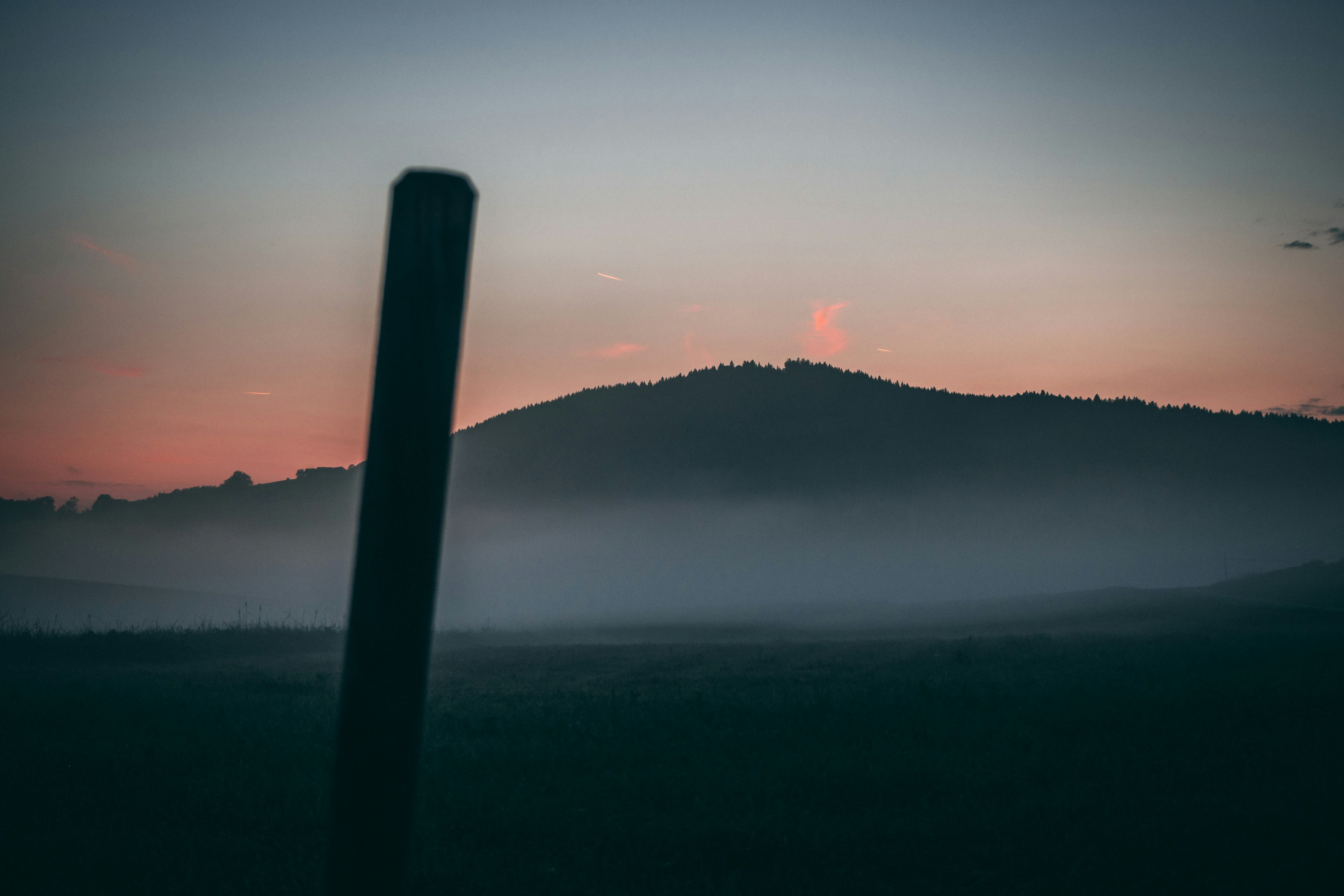 silhouette of mountain during daytime